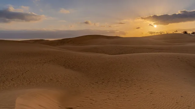 Zonsondergang over de zandduinen van Maspalomas op Gran Canaria